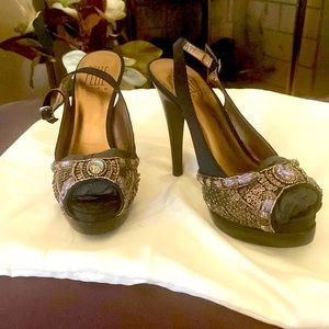 Beautiful Linea Pelle Moda sequins peep toe sling back with embellishments.